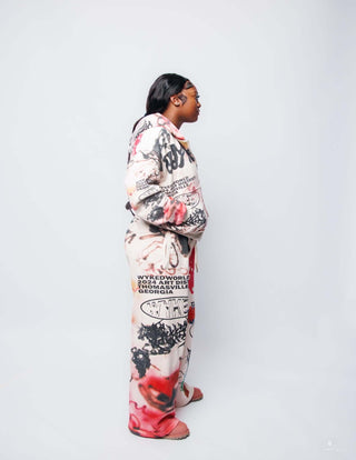 Model wearing GRAFFITI SWEATS, showcasing all over print design with oversized fit and 500 GSM fabric quality.